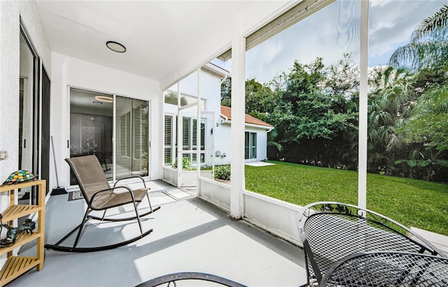 sunroom / solarium with plenty of natural light