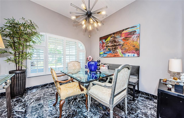 dining room with a notable chandelier