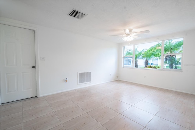 empty room with ceiling fan