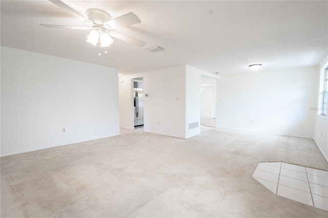 carpeted empty room with ceiling fan