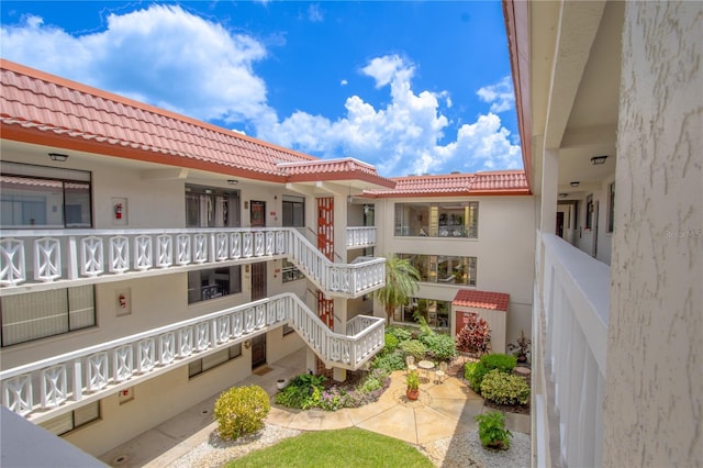 view of property with stairway