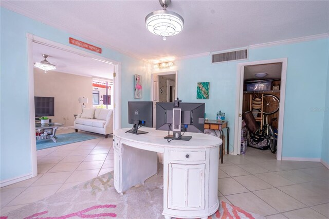 home office featuring ornamental molding, visible vents, baseboards, and light tile patterned flooring