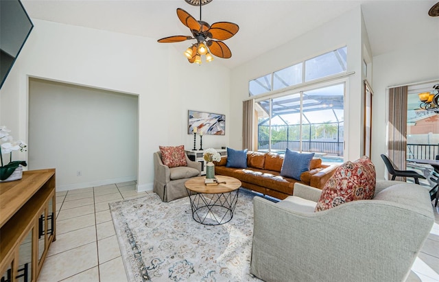 tiled living room featuring ceiling fan