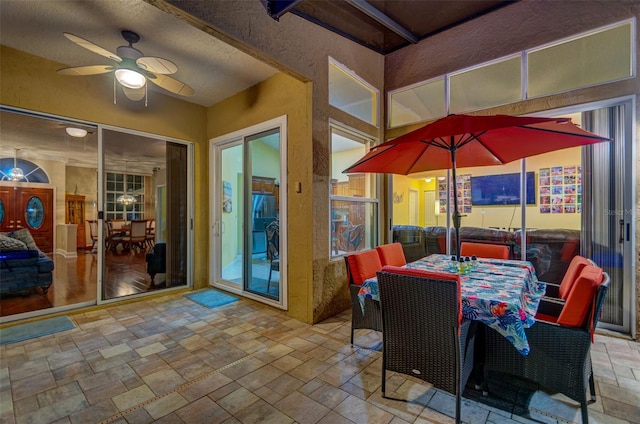 view of patio with ceiling fan