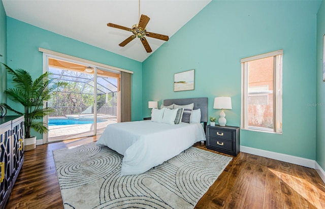 bedroom with ceiling fan, access to exterior, dark hardwood / wood-style floors, and high vaulted ceiling