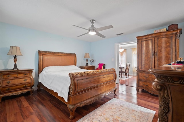 bedroom featuring ceiling fan and hardwood / wood-style floors