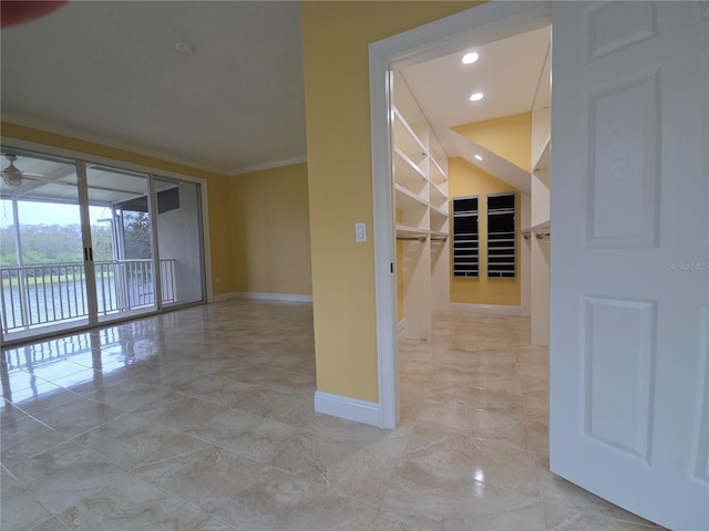 spare room with marble finish floor, recessed lighting, crown molding, baseboards, and ceiling fan