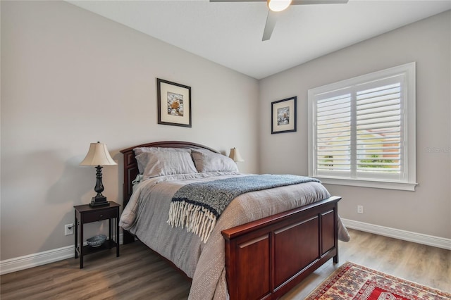 bedroom featuring hardwood / wood-style floors and ceiling fan