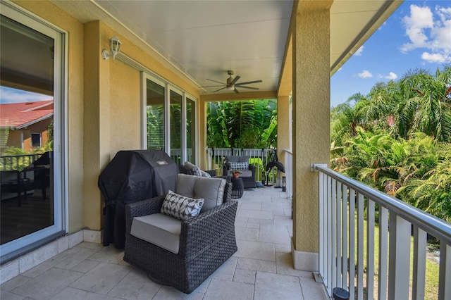 balcony featuring ceiling fan