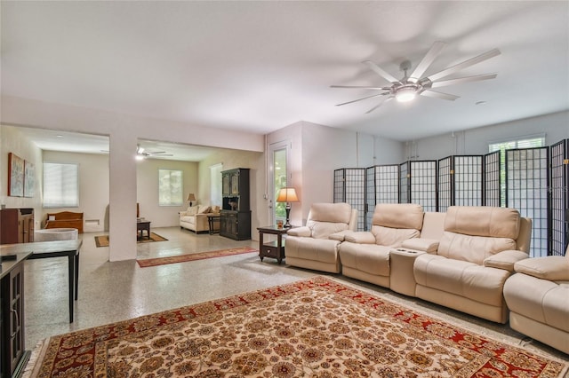 living room featuring ceiling fan