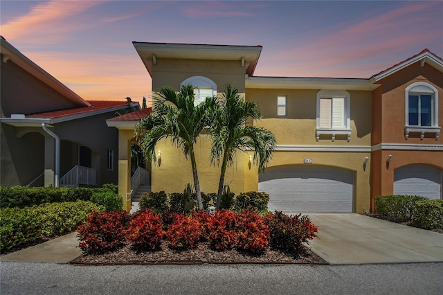 view of front of property featuring a garage