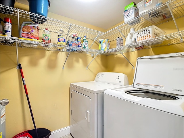 washroom with washing machine and dryer