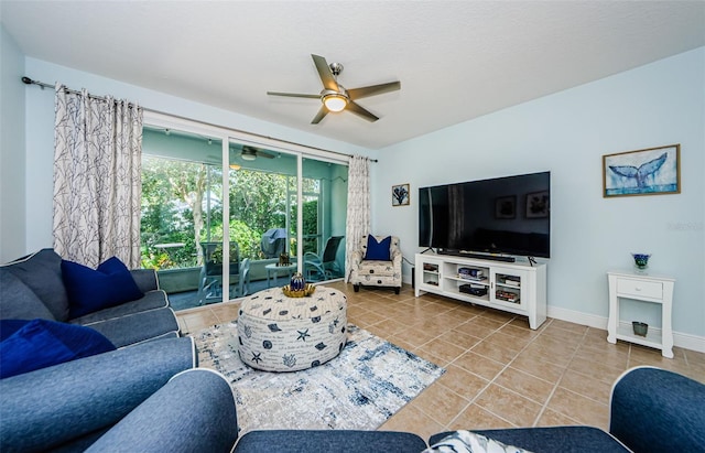 tiled living room featuring ceiling fan