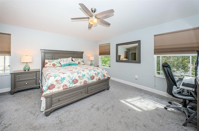 bedroom with ceiling fan and light colored carpet