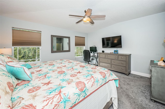 bedroom featuring ceiling fan, light colored carpet, and lofted ceiling