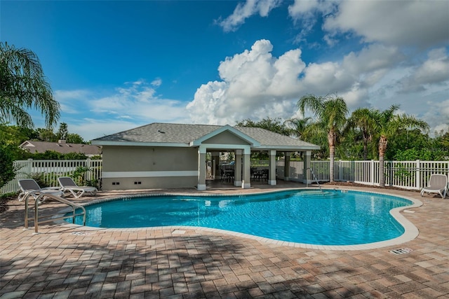 view of pool featuring a patio area