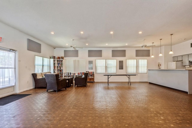 living room with ceiling fan