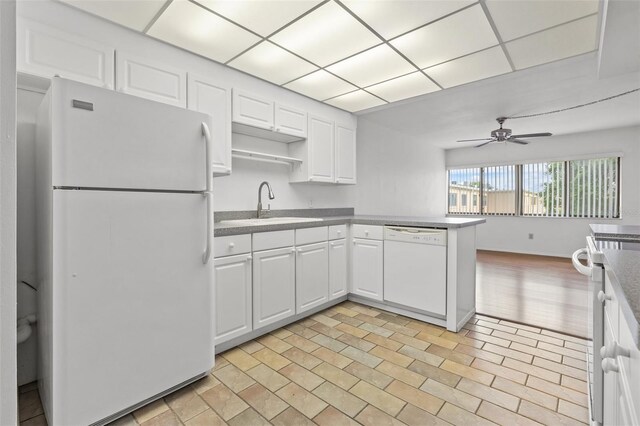 kitchen with light tile patterned flooring, ceiling fan, white appliances, and white cabinets