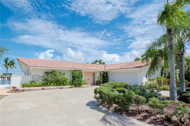 view of front of property featuring a garage