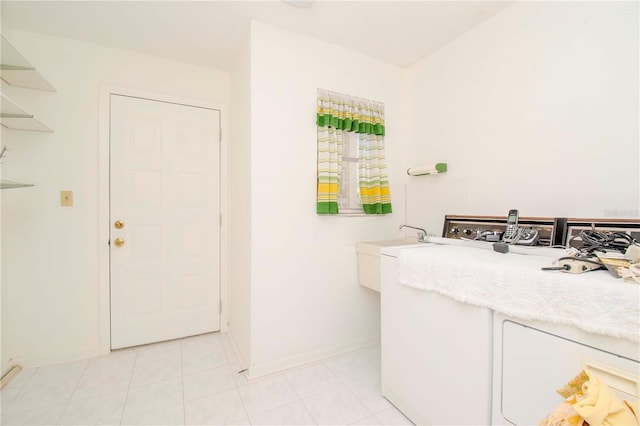 bathroom featuring tile patterned flooring and sink