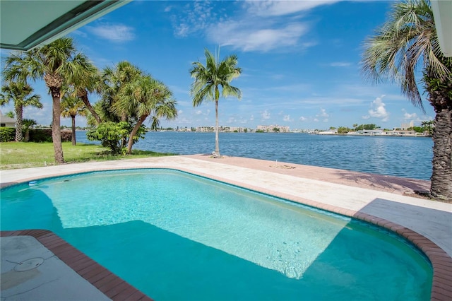 view of pool featuring a water view