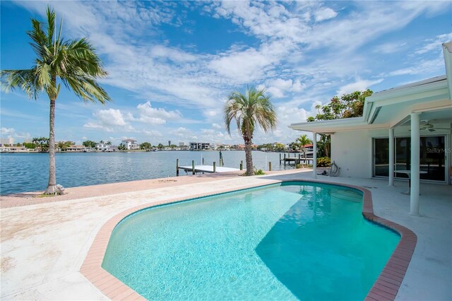 view of pool featuring a patio and ceiling fan