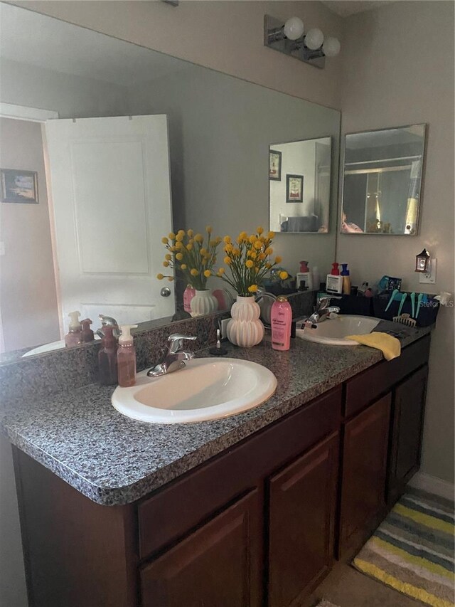 bathroom with double vanity