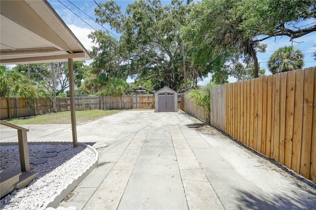 view of patio / terrace with a storage shed