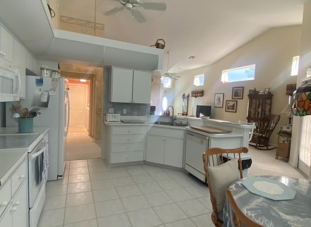 kitchen with white appliances, white cabinets, sink, light tile patterned flooring, and ceiling fan