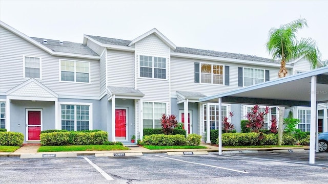 view of property featuring a carport