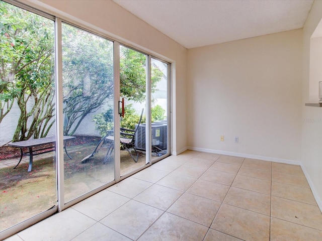 view of tiled spare room