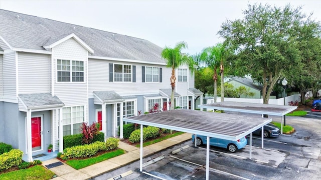 view of front of home featuring a carport