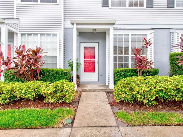 property entrance with a garage