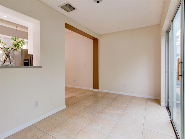 view of tiled spare room