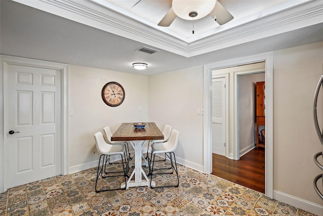 dining room featuring ceiling fan and ornamental molding