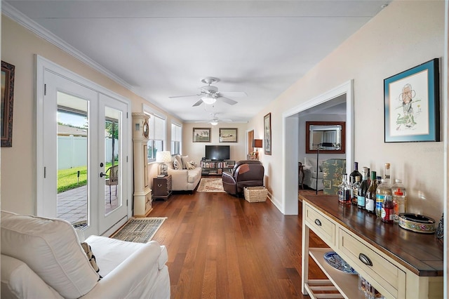 living room featuring ceiling fan, french doors, and dark wood-type flooring