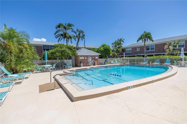 view of swimming pool featuring a patio