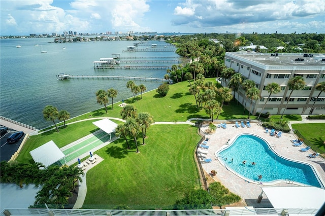 birds eye view of property with a water view