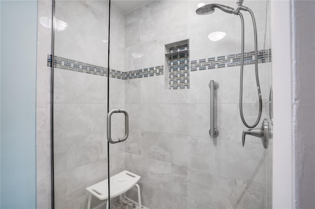 bathroom featuring an enclosed shower