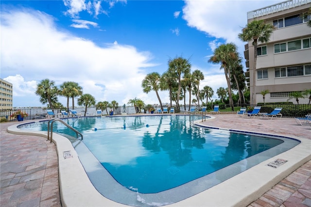 view of pool featuring a patio area