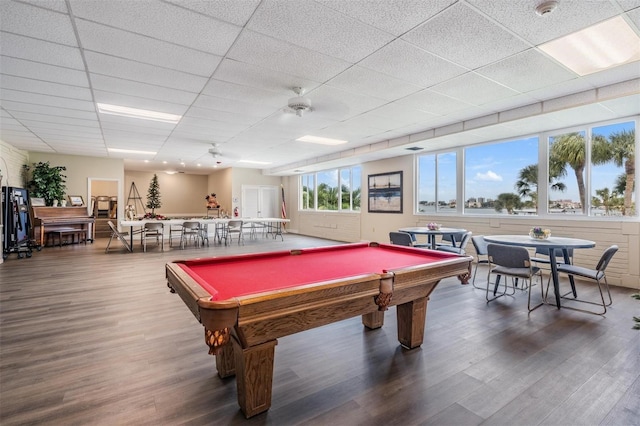 recreation room featuring dark wood-type flooring, billiards, and a paneled ceiling