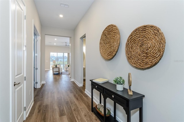 hall with dark hardwood / wood-style floors