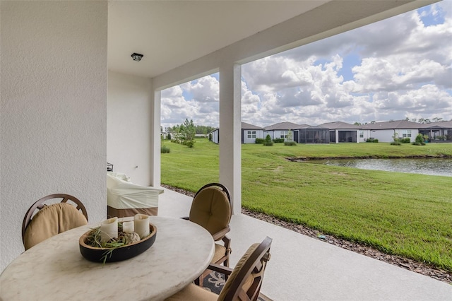 view of patio / terrace featuring a water view