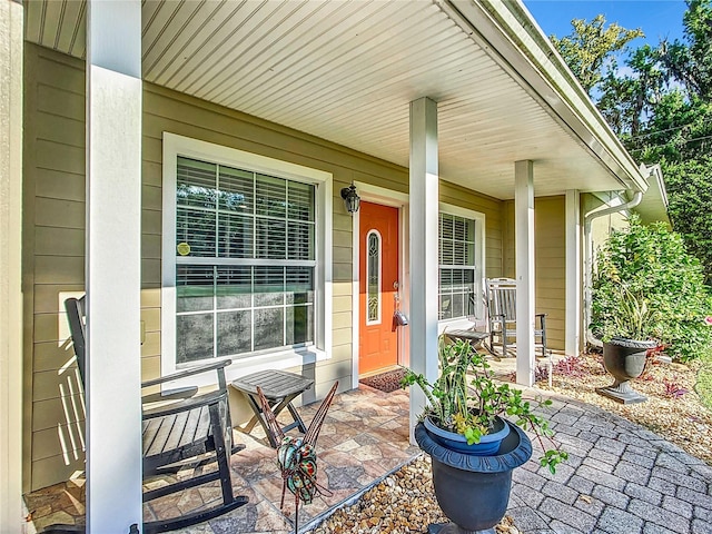 doorway to property featuring a porch