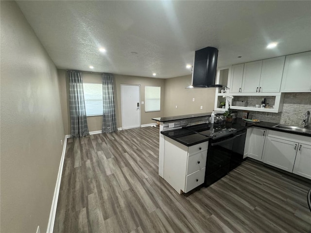 kitchen featuring white cabinetry, island exhaust hood, black / electric stove, and a textured ceiling