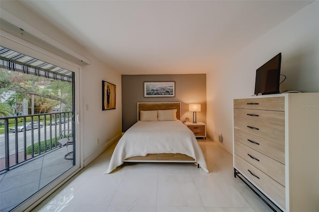 tiled bedroom featuring access to exterior and multiple windows