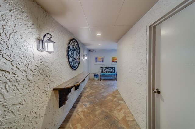 corridor featuring tile patterned flooring