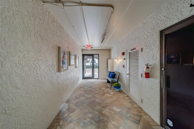 corridor with tile patterned floors