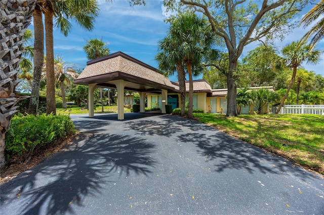 view of front of home with a front lawn