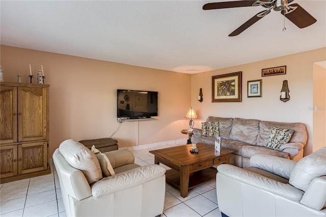 tiled living room featuring ceiling fan